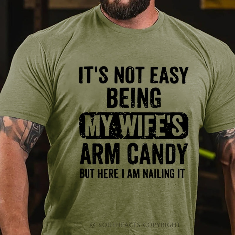 It's Not Easy Being My Wife's Arm Candy But Here I Am Nailing It T-Shirt