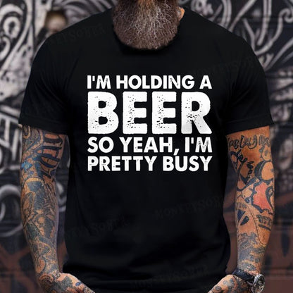 I'm Holding A Beer So Yeah，I'm Pretty Busy T-Shirts