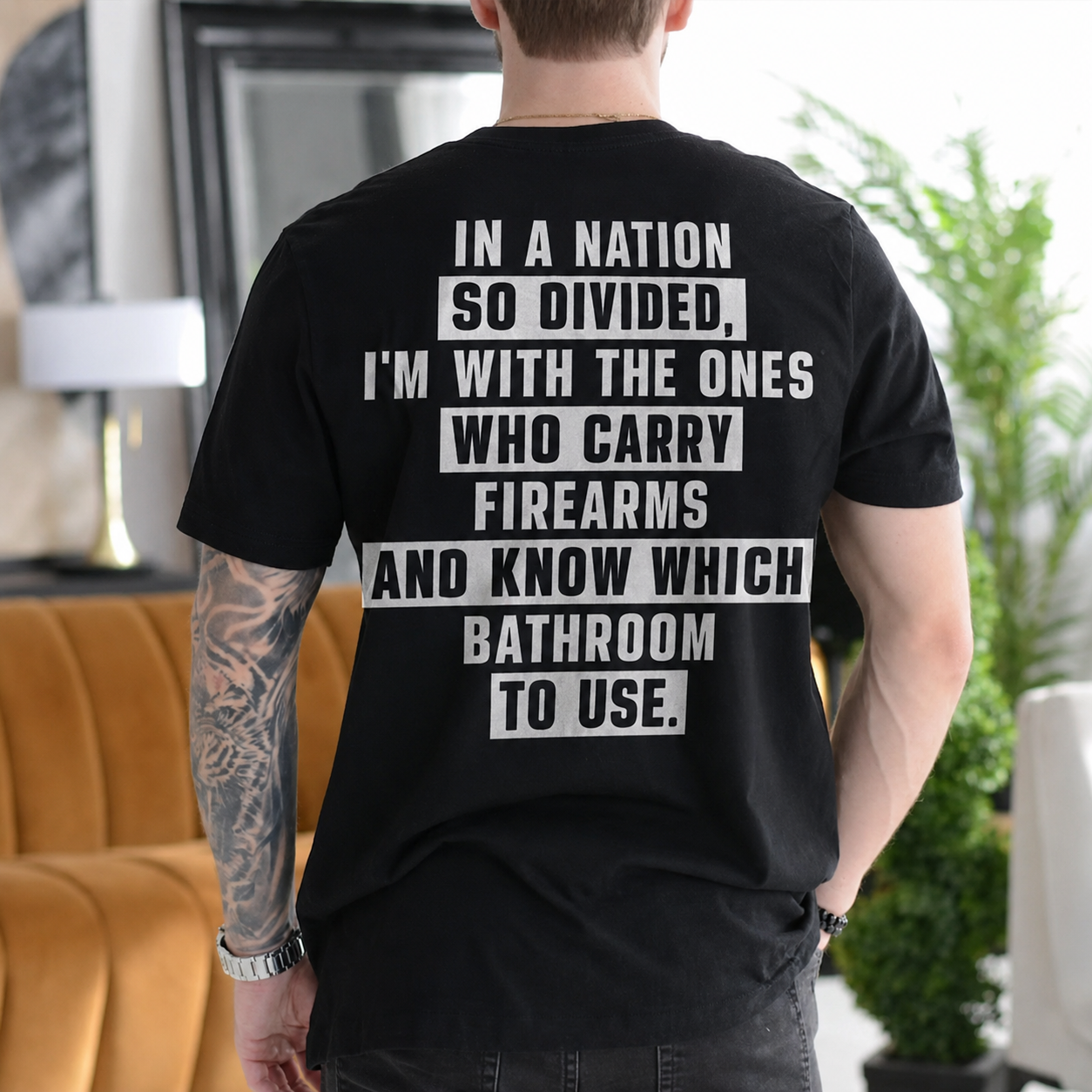 IN A NATION SO DIVIDED, I'M WITH THE ONES WHO CARRY FIREARMS AND KNOW WHICH BATHROOM TO USE Unisex T-shirt/Crewneck/Hoodie
