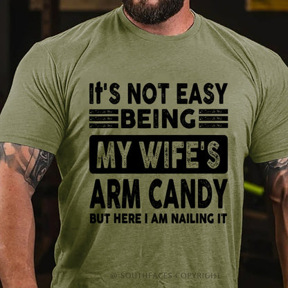 It's Not Easy Being My Wife's Arm Candy But Here I Am Nailing It T-Shirt