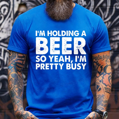 I'm Holding A Beer So Yeah，I'm Pretty Busy T-Shirts