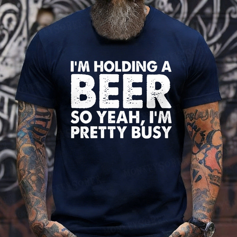 I'm Holding A Beer So Yeah，I'm Pretty Busy T-Shirts