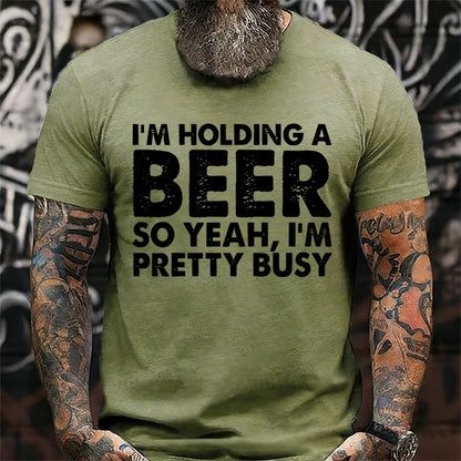 I'm Holding A Beer So Yeah，I'm Pretty Busy T-Shirts