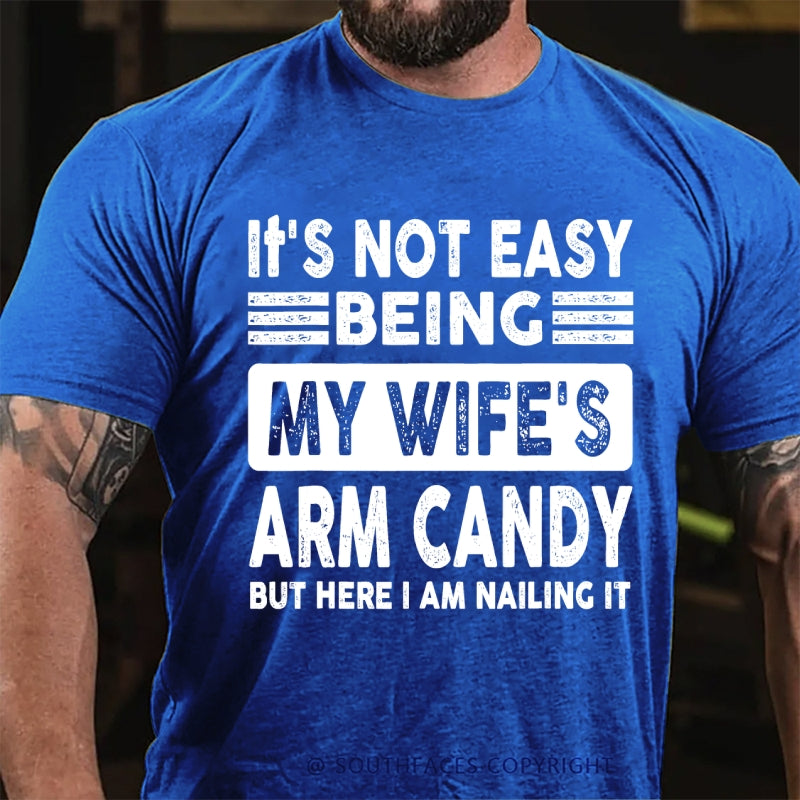 It's Not Easy Being My Wife's Arm Candy But Here I Am Nailing It T-Shirt